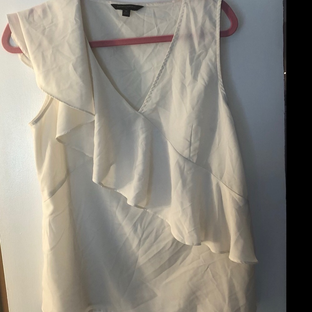 White sleeveless top